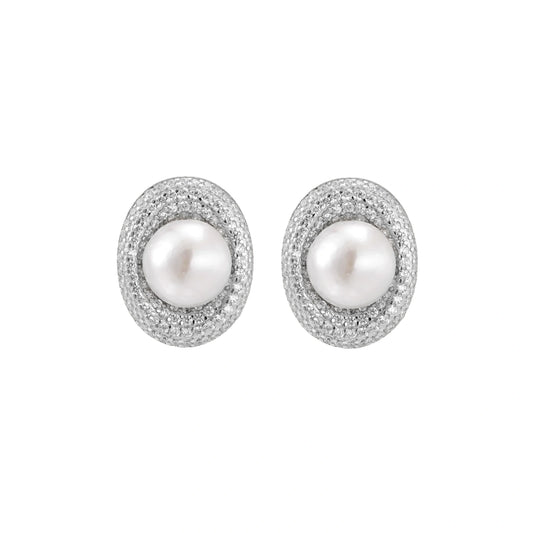 Elegant stud earrings with cream freshwater pearls surrounded by sparkly pavé crystals on rhodium-plated silver setting