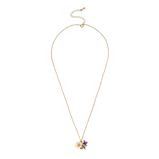 Gold-plated necklace with pink and purple enamel flower pendant featuring crystal accents on cream background