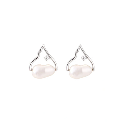 Silver mountain outline studs with baroque pearl and diamond accent on white background